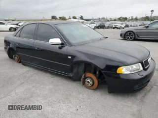 2000 Audi S4 z VIN WAUDD68D5YA126521, wystawiony jako Copart lot #53467815 z przebiegiem 138 629 mil mil oraz Szkoda całkowita • Salvage title. Historia ofert i sprzedaży dostępna na DreamBid. Obrazek 4.