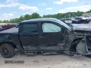 2017 Chevrolet Colorado 4WD Z71 z VIN 1GCGTDENXH1223251, wystawiony jako IAAI lot #42205600 z przebiegiem 108 994 mil mil oraz . Historia ofert i sprzedaży dostępna na DreamBid. Obrazek 14.