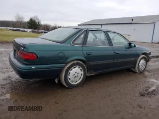 1995 Ford Taurus GL with VIN 1FALP52U1SA108202, listed as a Copart auction lot 85676434 with 102,669 mi miles and Salvage title. Bid and sale history available at DreamBid. Image 3.