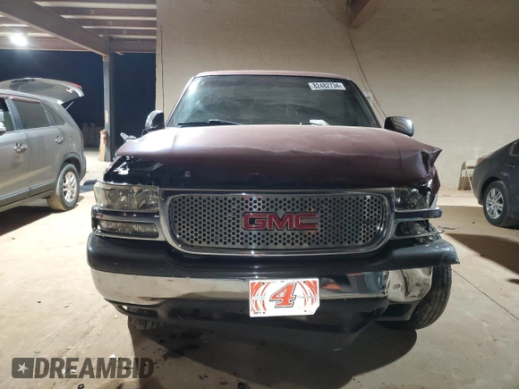 2000 GMC New Sierra 1500 SLE with VIN 1GTEK19T3YE218791, listed as a Copart auction lot 82482734 with 242,277 mi miles and Salvage Title. Bid and sale history available at carsss.com. Image 5.