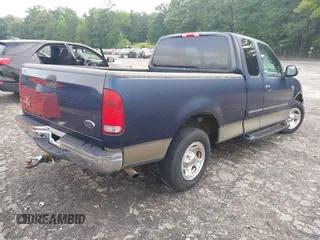 2002 Ford F-150 XL with VIN 1FTRX17202NA66022, listed as a IAAI auction lot 42382320 with 87,916 mi miles and . Bid and sale history available at DreamBid. Image 4.