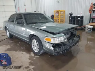 2005 Ford Crown Victoria LX with VIN 2FAFP74W05X124670, listed as a IAAI auction lot 41581963 with 135,486 mi miles. Bid and sale history available at carsss.com. Image 1.