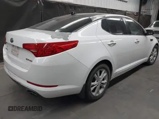 2013 Kia Optima EX with VIN 5XXGN4A79DG120709, listed as a IAAI auction lot 42004745 with 171,409 mi miles. Bid and sale history available at carsss.com. Image 4.