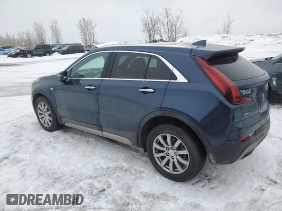 2022 Cadillac XT4 AWD Premium Luxury with VIN 1GYFZDR45NF153100, listed as a Copart auction lot 47483535 with 46,616 mi miles and Salvage Title. Bid and sale history available at carsss.com. Image 2.