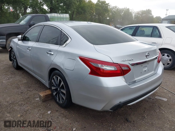 2018 Nissan Altima SR with VIN 1N4AL3AP6JC151861, listed as a IAAI auction lot 40010666 with 140,228 mi miles and . Bid and sale history available at DreamBid. Image 3.