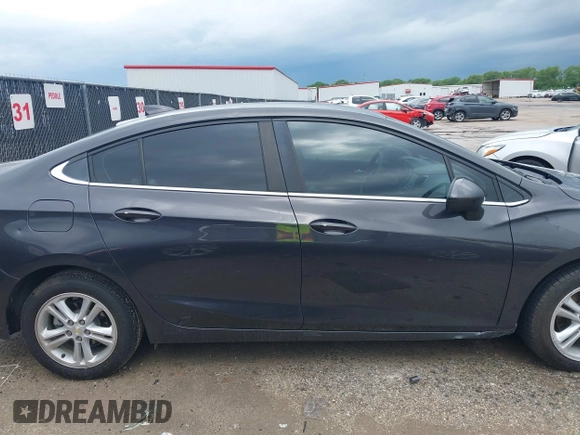 2017 Chevrolet Cruze LT with VIN 1G1BE5SM5H7151791, listed as a IAAI auction lot 42165976 with 70,044 mi miles and . Bid and sale history available at DreamBid. Image 13.