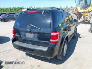2012 Ford Escape XLT z VIN 1FMCU9D76CKC59030, wystawiony jako IAAI lot #42396412 z przebiegiem 101 223 mil mil oraz . Historia ofert i sprzedaży dostępna na DreamBid. Obrazek 4.