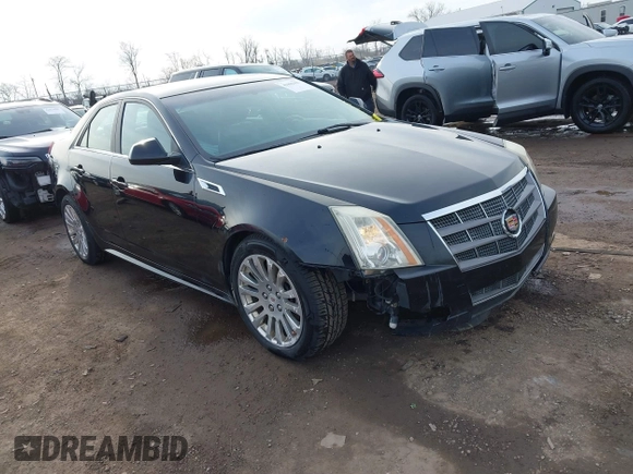 2011 Cadillac CTS Premium with VIN 1G6DS5ED7B0101210, listed as a IAAI auction lot 41802027 with 127,701 mi miles. Bid and sale history available at carsss.com. Image 1.