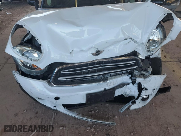 2015 MINI Countryman with VIN WMWZB3C50FWR45253, listed as a Copart auction lot 63608655 with 123,701 mi miles and Salvage title. Bid and sale history available at DreamBid. Image 12.