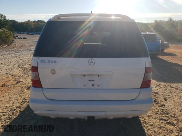 2002 Mercedes-Benz M-Class with VIN 4JGAB54E02A353932, listed as a Copart auction lot 75386794 with 157,027 mi miles and Clean Title. Bid and sale history available at carsss.com. Image 6.