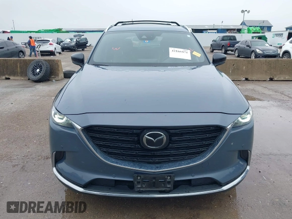 2021 Mazda CX-9 Grand Touring with VIN JM3TCBDY9M0534966, listed as a IAAI auction lot 42166071 with 77,817 mi miles and . Bid and sale history available at DreamBid. Image 12.