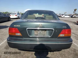 1996 Acura RL with VIN JH4KA965XTC009917, listed as a Copart auction lot 65083665 with 197,486 mi miles and Salvage title. Bid and sale history available at DreamBid. Image 6.