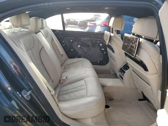 2016 BMW 7 Series 740i z VIN WBA7E2C53GG504611, wystawiony jako Copart lot #42253395 z przebiegiem 35 965 mil mil oraz Szkoda całkowita • Salvage title. Historia ofert i sprzedaży dostępna na DreamBid. Obrazek 10.
