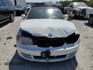2008 BMW 1 Series 128i with VIN WBAUN13508VH77566, listed as a Copart auction lot 49605155 with 66,885 mi miles and Salvage Title. Bid and sale history available at DreamBid. Image 5.