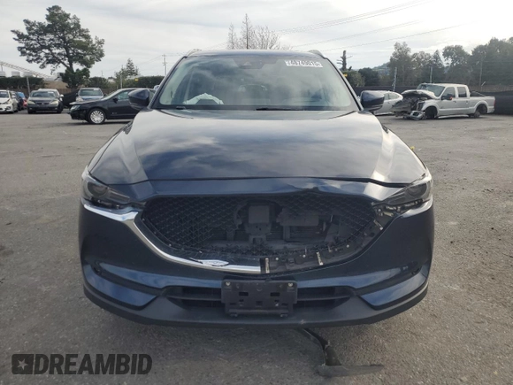 2018 Mazda CX-5 Grand Touring with VIN JM3KFADM7J0380568, listed as a Copart auction lot 48749015 with 53,401 mi miles and Salvage Title. Bid and sale history available at carsss.com. Image 5.