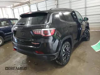 2020 Jeep Compass Trailhawk with VIN 3C4NJDDB0LT159324, listed as a Copart auction lot 50961595 with 86,446 mi miles and Salvage Title. Bid and sale history available at carsss.com. Image 3.