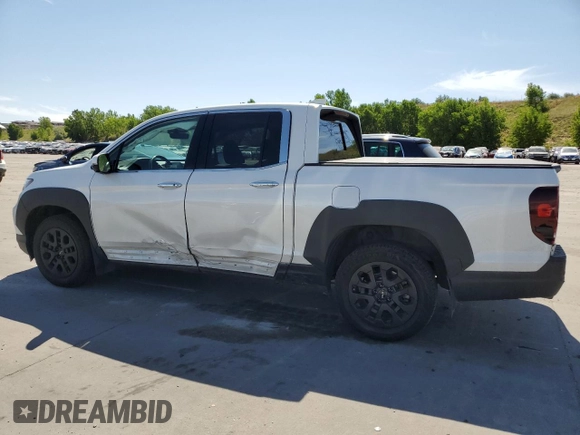 2023 Honda Ridgeline RTL-E with VIN 5FPYK3F76PB011963, listed as a Copart auction lot 63079165 with 25,658 mi miles and Salvage title. Bid and sale history available at DreamBid. Image 2.