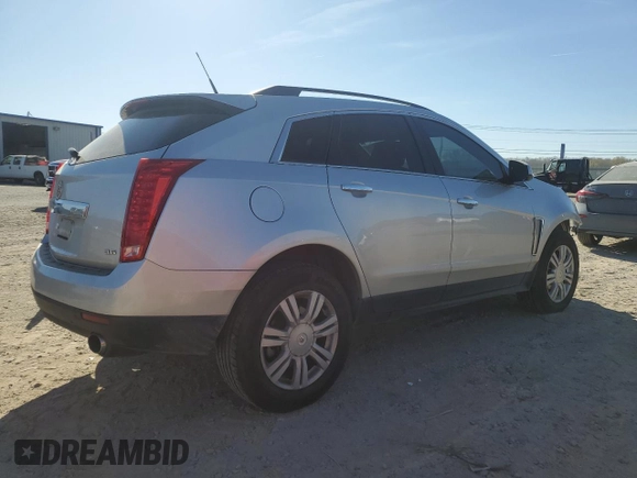2014 Cadillac SRX with VIN 3GYFNAE36ES680324, listed as a Copart auction lot 50034625 with 150,014 mi miles and Salvage Title. Bid and sale history available at DreamBid. Image 3.