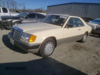 1988 Mercedes-Benz 300 with VIN WDBEA50D9JA698251, listed as a Copart auction lot 46977055 with 107,949 mi miles and Salvage Title. Bid and sale history available at DreamBid. Image 1.