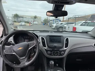 2021 Chevrolet Equinox LS z VIN 3GNAXFEV9MS175201, wystawiony jako IAAI lot #42495755 z przebiegiem 114 474 mil mil oraz . Historia ofert i sprzedaży dostępna na DreamBid. Obrazek 2.