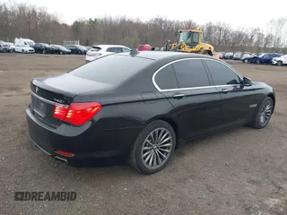 2011 BMW 7 Series 740i with VIN WBAKA4C55BC612584, listed as a IAAI auction lot 42021367 with 139,190 mi miles. Bid and sale history available at carsss.com. Image 4.