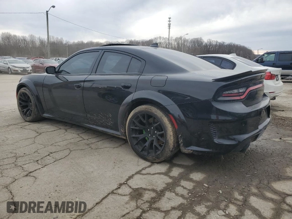 2021 Dodge Charger Scat Pack with VIN 2C3CDXGJ7MH584590, listed as a Copart auction lot 46396325 with 51,257 mi miles and Salvage Title. Bid and sale history available at DreamBid. Image 2.
