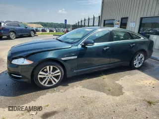 2015 Jaguar XJ Portfolio with VIN SAJWA2GZ3F8V83733, listed as a Copart auction lot 61975205 with 127,884 mi miles and Clean title. Bid and sale history available at DreamBid. Image 1.