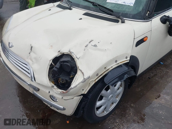 2004 MINI Hardtop with VIN WMWRC33434TJ60941, listed as a IAAI auction lot 39078161 with 143,107 mi miles and . Bid and sale history available at DreamBid. Image 6.