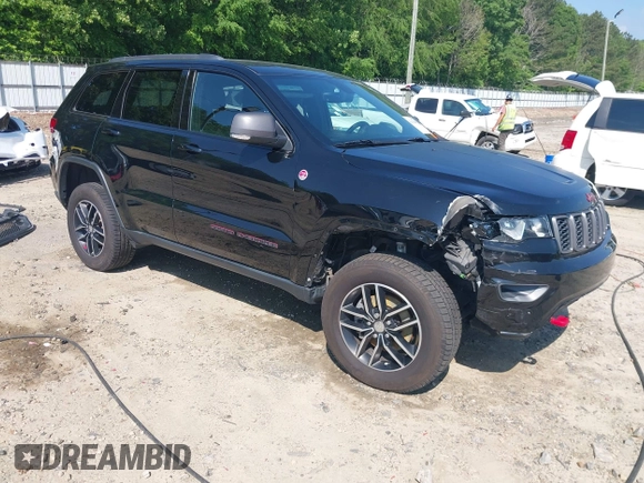 2017 Jeep Grand Cherokee Trailhawk with VIN 1C4RJFLG4HC940652, listed as a IAAI auction lot 42135489 with 102,593 mi miles and . Bid and sale history available at DreamBid. Image 1.