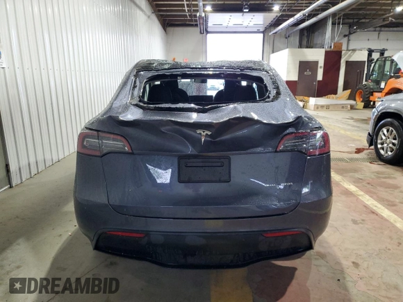 2023 Tesla Model Y Long Range z VIN 7SAYGDEE8PF814874, wystawiony jako Copart lot #56546365 z przebiegiem 20 919 mil mil oraz Szkoda całkowita • Salvage title. Historia ofert i sprzedaży dostępna na DreamBid. Obrazek 6.