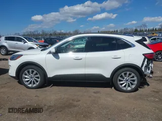 2022 Ford Escape Titanium with VIN 1FMCU9J93NUA99685, listed as a IAAI auction lot 41867437 with 36,987 mi miles and . Bid and sale history available at DreamBid. Image 15.