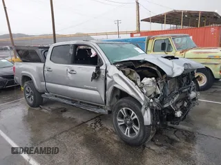 2018 Toyota Tacoma SR5 with VIN 3TMBZ5DN0JM012259, listed as a IAAI auction lot 41709709 with Not provided miles and . Bid and sale history available at DreamBid. Image 1.