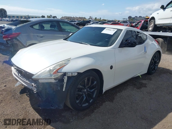 2016 Nissan 370Z Sport z VIN JN1AZ4EH9GM931683, wystawiony jako IAAI lot #42000779 z przebiegiem 113 919 mil mil oraz . Historia ofert i sprzedaży dostępna na DreamBid. Obrazek 17.