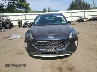 2021 Ford Escape SEL Hybrid z VIN 1FMCU9CZ7MUA94260, wystawiony jako Copart lot #71013514 z przebiegiem Nie podano mil oraz Szkoda całkowita • Salvage title. Historia ofert i sprzedaży dostępna na DreamBid. Obrazek 5.