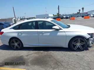 2021 Honda Accord Touring with VIN 1HGCV2F92MA024124, listed as a IAAI auction lot 42353443 with 22,457 mi miles and . Bid and sale history available at DreamBid. Image 13.
