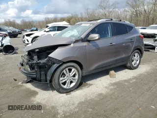 2011 Hyundai Tucson Limited with VIN KM8JUCAC2BU200517, listed as a Copart auction lot 53252005 with 158,502 mi miles and Salvage Title. Bid and sale history available at DreamBid. Image 1.