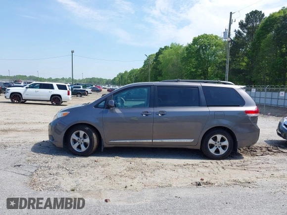 2014 Toyota Sienna LE AAS with VIN 5TDKK3DC4ES431664, listed as a IAAI auction lot 42081429 with 208,505 mi miles and . Bid and sale history available at carsss.com. Image 14.