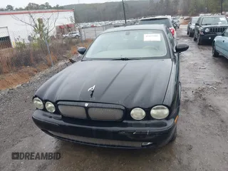 2004 Jaguar XJ with VIN SAJEA71C34SG10171, listed as a IAAI auction lot 41412081 with 150,488 mi miles. Bid and sale history available at carsss.com. Image 6.