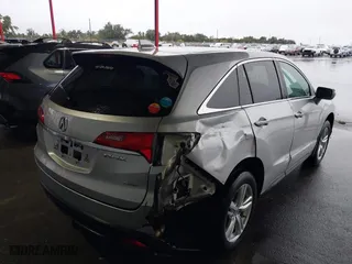 2015 Acura RDX Tech Pkg with VIN 5J8TB4H50FL029070, listed as a IAAI auction lot 41555857 with 134,868 mi miles. Bid and sale history available at carsss.com. Image 4.