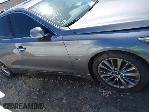 2019 Infiniti Q50 3.0t LUXE with VIN JN1EV7AP5KM519569, listed as a IAAI auction lot 42078137 with 134,486 mi miles. Bid and sale history available at carsss.com. Image 13.