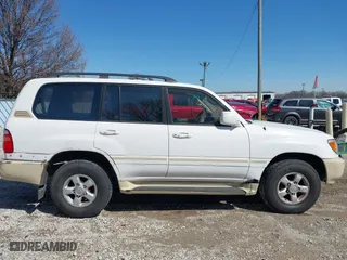 2000 Toyota Land Cruiser with VIN JT3HT05J5Y0126396, listed as a IAAI auction lot 41986185 with 201,156 mi miles. Bid and sale history available at carsss.com. Image 14.