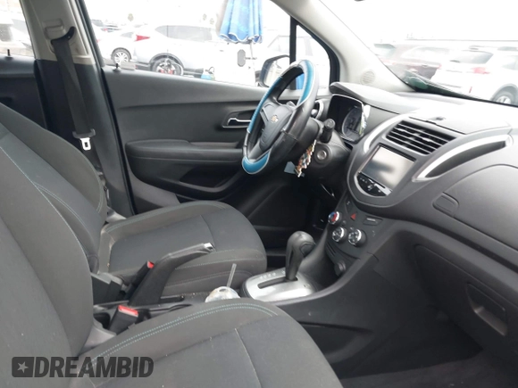2015 Chevrolet Trax LS with VIN KL7CJKSB9FB197233, listed as a IAAI auction lot 41198111 with 54,889 mi miles. Bid and sale history available at carsss.com. Image 5.