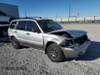 2003 Subaru Forester XS with VIN JF1SG65603G741030, listed as a Copart auction lot 46109315 with 154,469 mi miles and Salvage title. Bid and sale history available at DreamBid. Image 4.