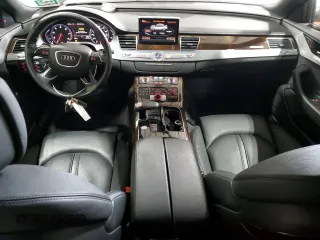 2015 Audi A8 z VIN WAUJGAFDXFN008499, wystawiony jako Copart lot #87658385 z przebiegiem 103 175 mil mil oraz Szkoda całkowita • Salvage title. Historia ofert i sprzedaży dostępna na DreamBid. Obrazek 8.