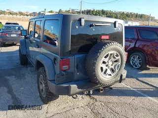 2014 Jeep Wrangler Unlimited Rubicon X with VIN 1C4BJWFG3EL134522, listed as a IAAI auction lot 41221381 with 66,897 mi miles and . Bid and sale history available at DreamBid. Image 3.