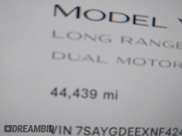 2022 Tesla Model Y Long Range with VIN 7SAYGDEEXNF424856, listed as a IAAI auction lot 41059718 with 44,439 mi miles and . Bid and sale history available at carsss.com. Image 16.