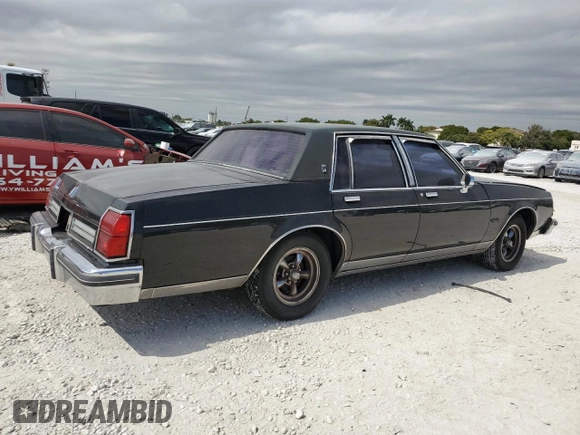1985 Oldsmobile 88 z VIN 1G3BV69Y1FY384631, wystawiony jako Copart lot #43389795 z przebiegiem 180 641 mil mil oraz Szkoda całkowita • Salvage title. Historia ofert i sprzedaży dostępna na DreamBid. Obrazek 3.