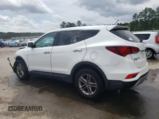2018 Hyundai Santa Fe 2.4L с VIN 5XYZT3LB1JG564782, выставлен на аукционе Copart как лот 51620605 с пробегом 126 066 миль миль и Списание • Salvage title. История ставок и продаж доступна на DreamBid. Изображение 2.