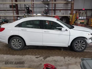 2013 Chrysler 200 Touring with VIN 1C3CCBBB2DN592416, listed as a IAAI auction lot 41732350 with 121,579 mi miles and . Bid and sale history available at carsss.com. Image 13.