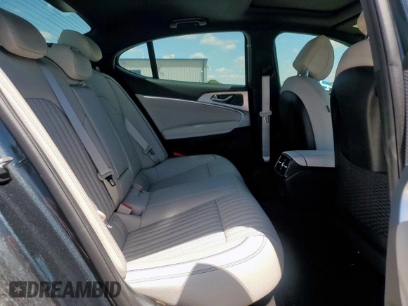 2023 Genesis G70 2.0T with VIN KMTG34TA7PU133747, listed as a Copart auction lot 56338345 with 27,190 mi miles and Salvage title. Bid and sale history available at DreamBid. Image 10.